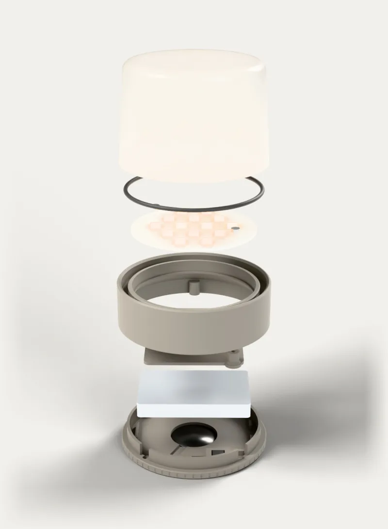 A shroud taken apart: frosted glass jar, O-ring, LED board, body, deck, cell and base.